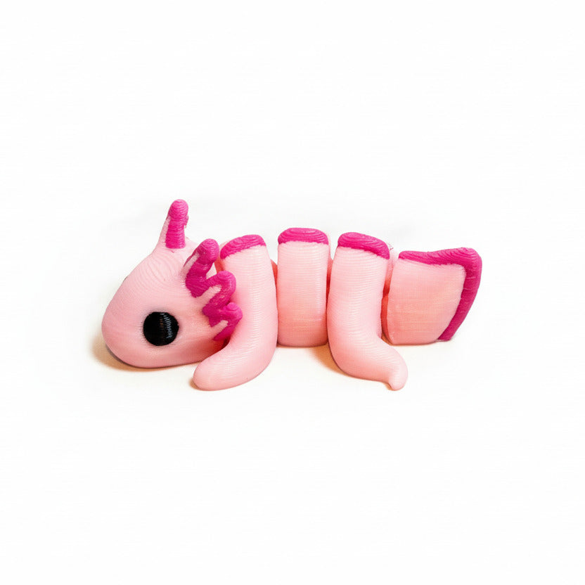 3D-printed articulated axolotl figurine on a white background featuring a pale pink body with vibrant magenta gills and fins, visible textured print layers, and large black eyes